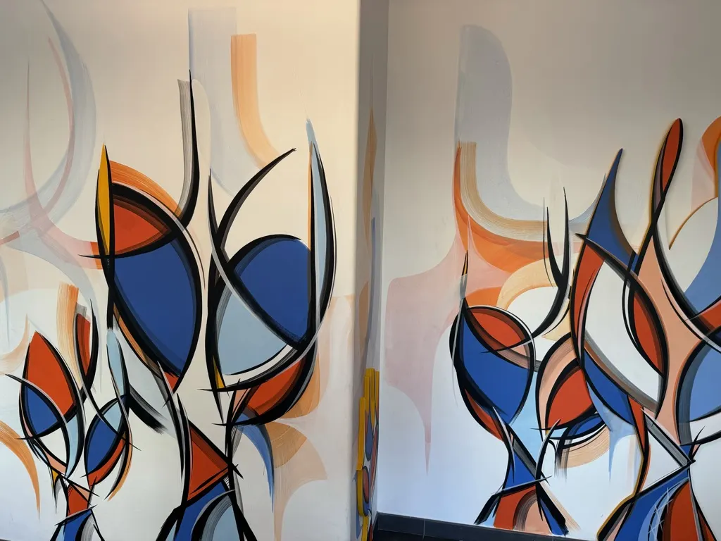 Fresque artistique dans un couloir de la crèche La Maison Kangourou Peupliers