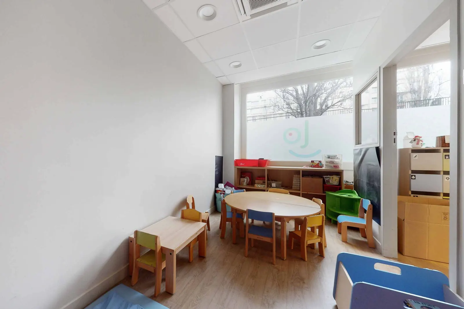 Salle de jeux calme à la crèche Babilou Paris Exelmans