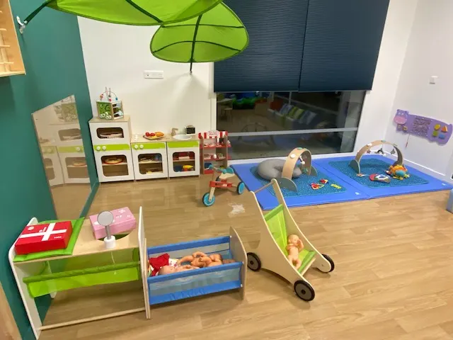 Coin jeux et dinette de la micro-crèche Les Roudoudous à Copponex