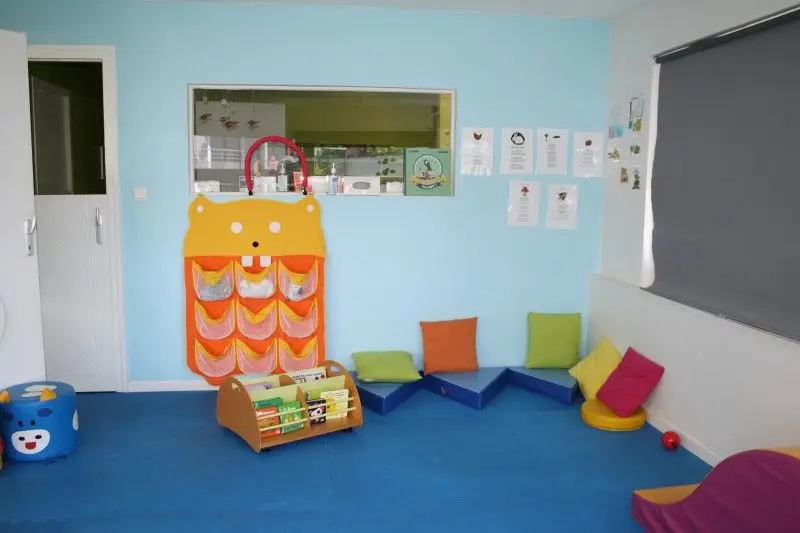 Coin repos et lecture de la micro-crèche à La Rochelle
